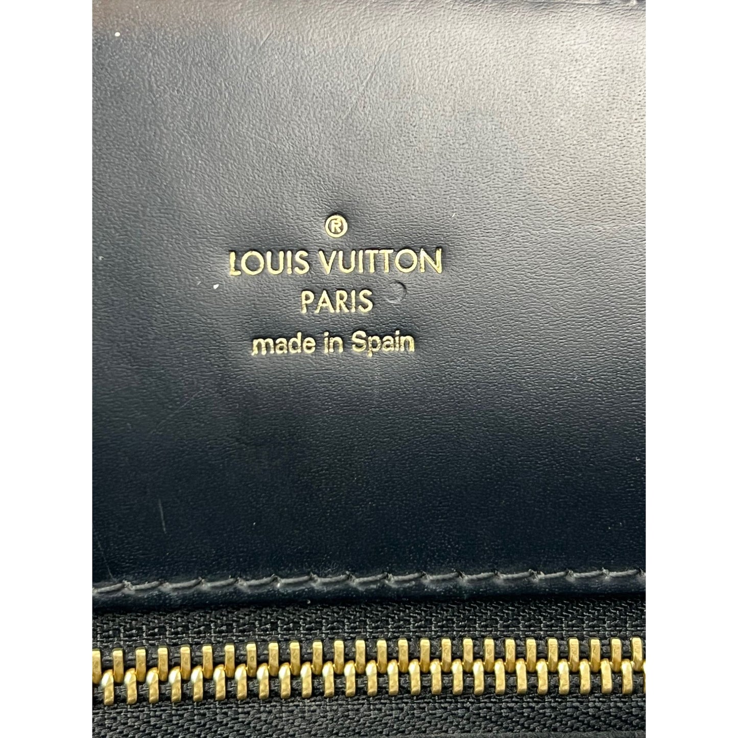 
                  
                    Louis Vuitton Phenix Monogram Leather Tote Bag
                  
                