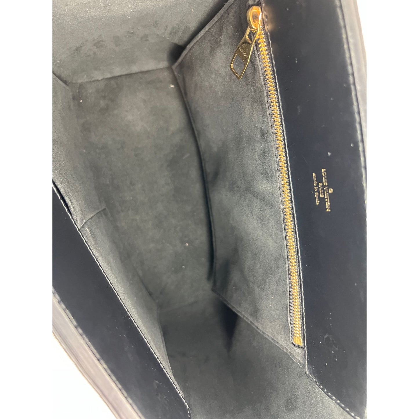 
                  
                    Louis Vuitton Phenix Monogram Leather Tote Bag
                  
                