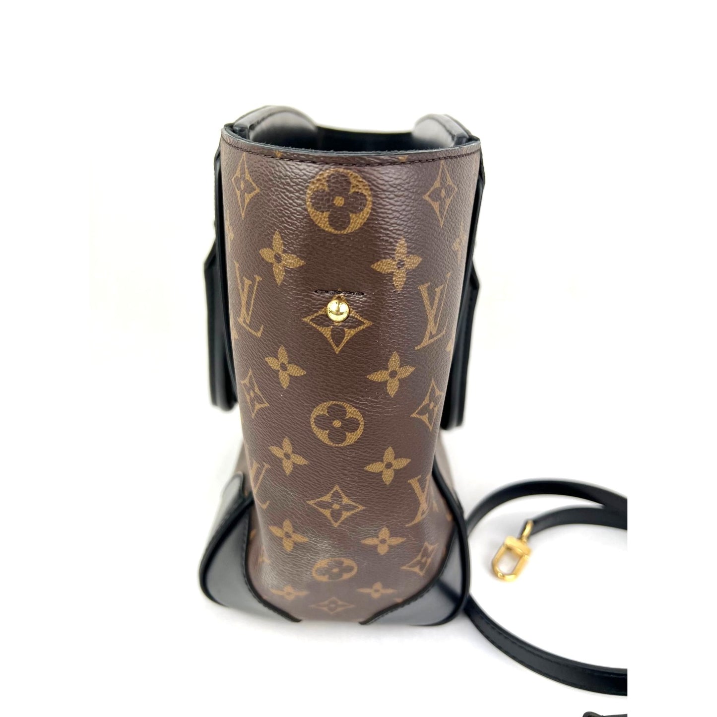 
                  
                    Louis Vuitton Phenix Monogram Leather Tote Bag
                  
                