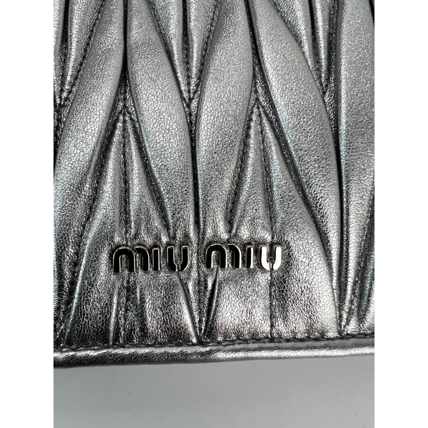 
                  
                    Miu Miu Metallic Silver Nappa Matelasse Crystal Embellished Lady Bag
                  
                