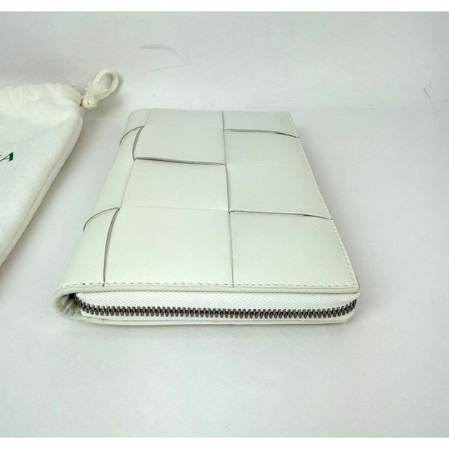 
                  
                    Bottega Veneta Intrecciato Leather White Cassette Zip Around Wallet
                  
                