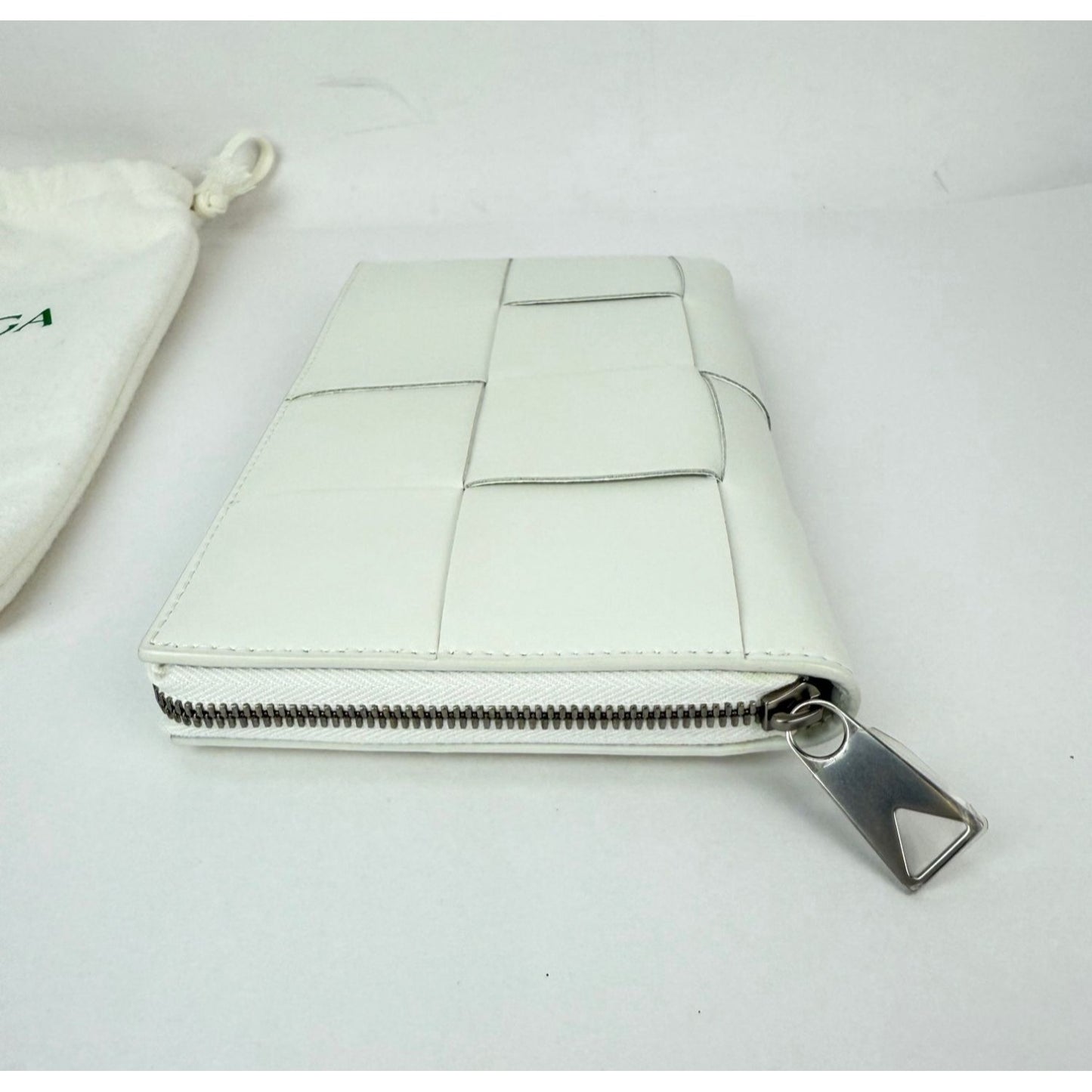 
                  
                    Bottega Veneta Intrecciato Leather White Cassette Zip Around Wallet
                  
                