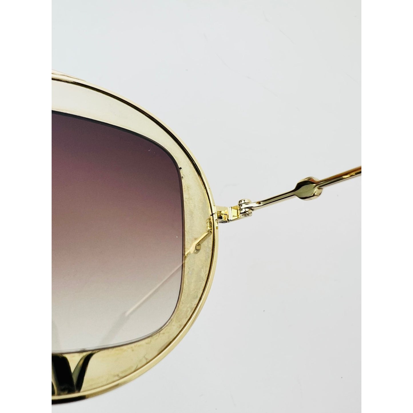 
                  
                    Gucci Round Frame Sylvie Web Sunglasses GG0105S
                  
                