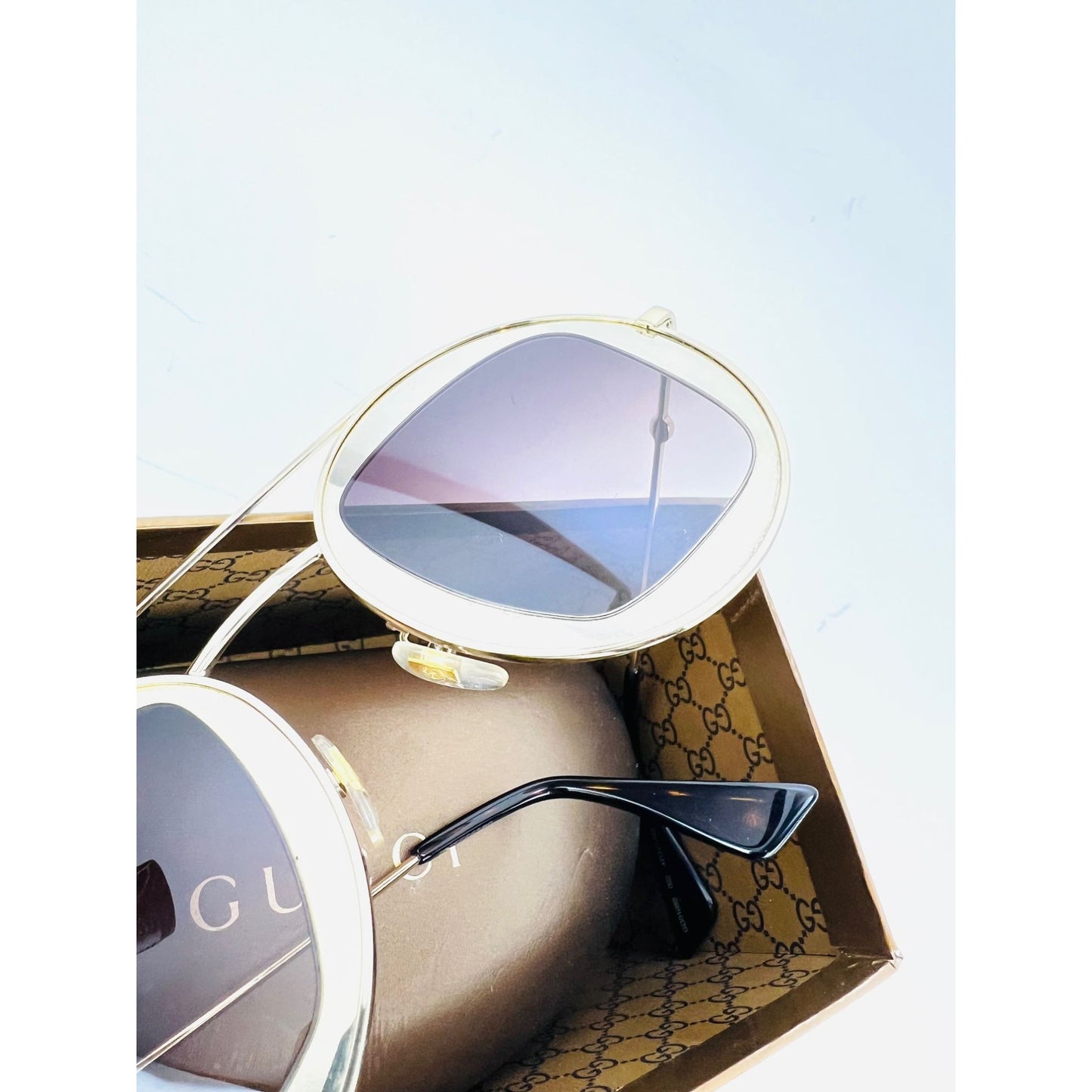 
                  
                    Gucci Round Frame Sylvie Web Sunglasses GG0105S
                  
                
