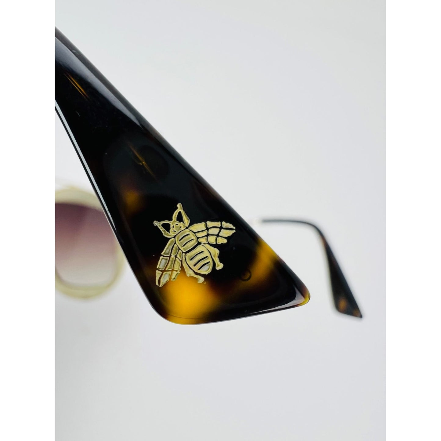 
                  
                    Gucci Round Frame Sylvie Web Sunglasses GG0105S
                  
                