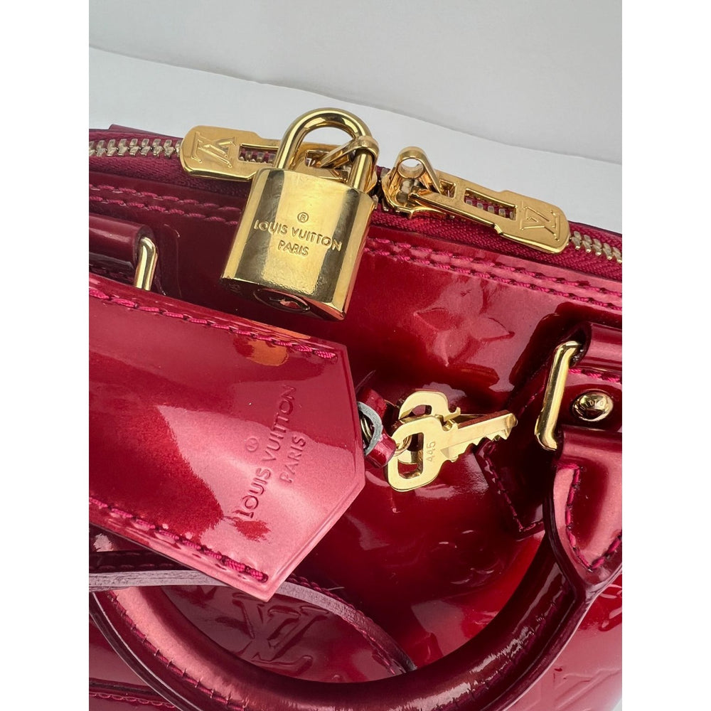 
                  
                    Louis Vuitton Alma BB Monogram Red Vernis Patent Leather Crossbody Bag
                  
                