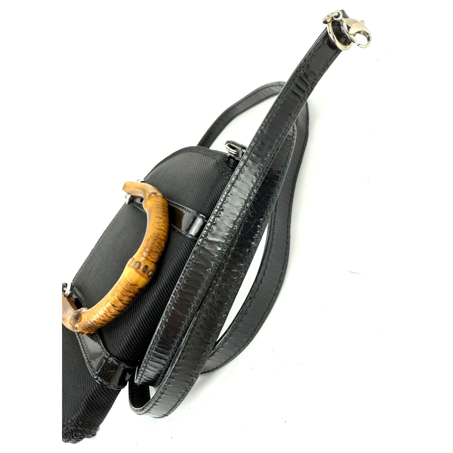 
                  
                    Gucci Bamboo Half Moon Mini Black Canvas Crossbody Bag
                  
                