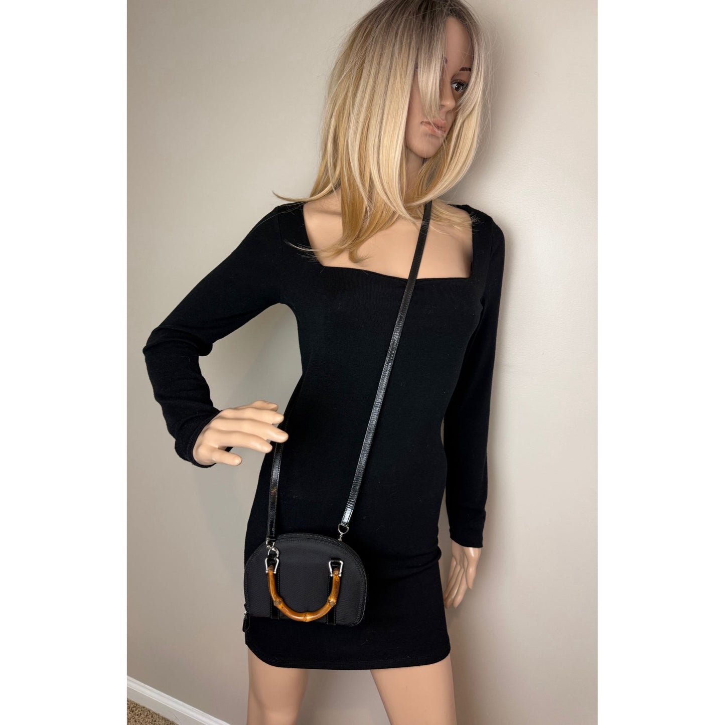 
                  
                    Gucci Bamboo Half Moon Mini Black Canvas Crossbody Bag
                  
                