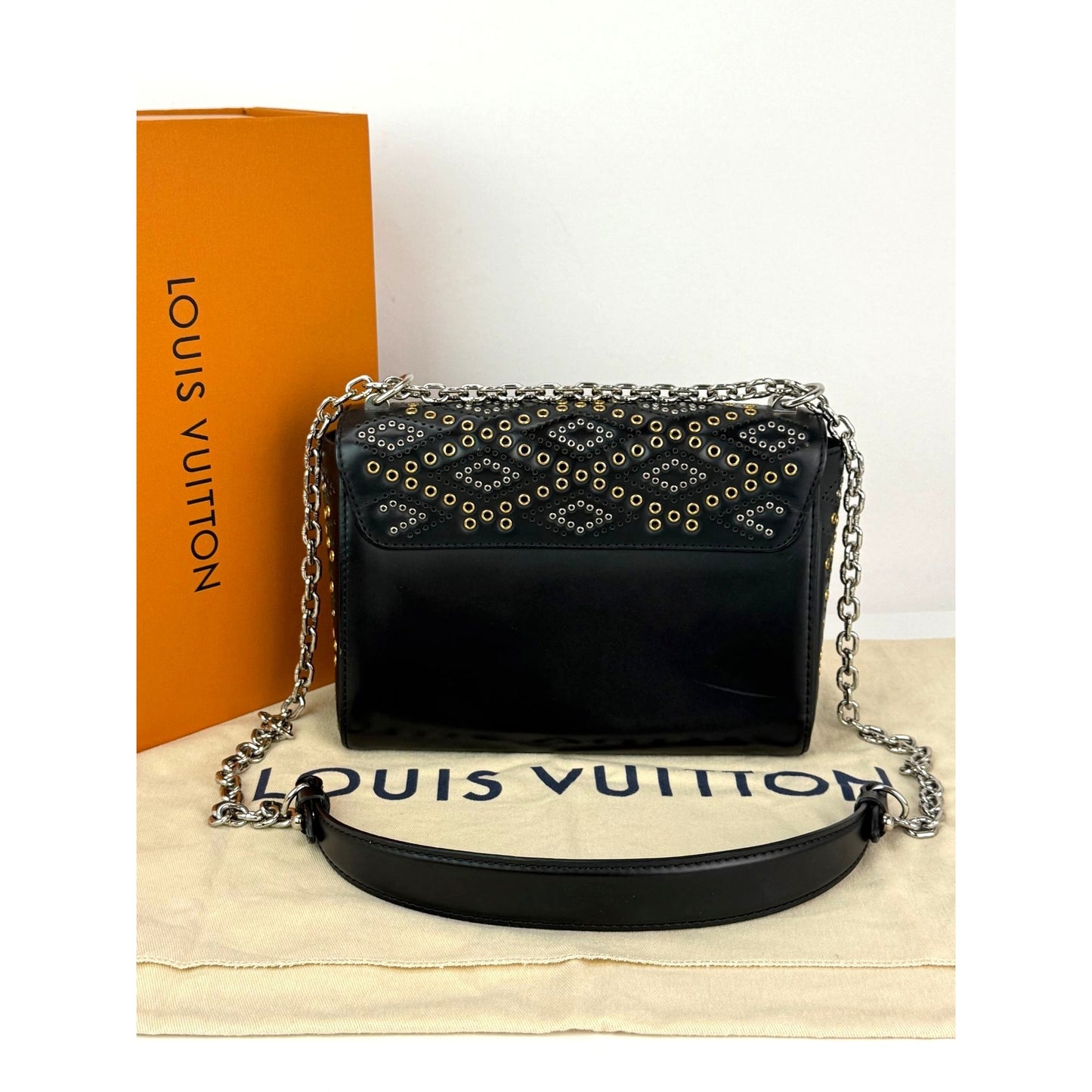 
                  
                    Louis Vuitton Calfskin Eyelet Twist MM Black Gold Silver Shoulder Bag
                  
                