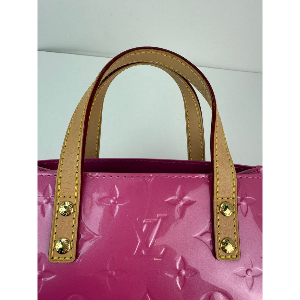 
                  
                    Louis Vuitton Vernis reade PM NM Neon Pink Crossbody Bag
                  
                
