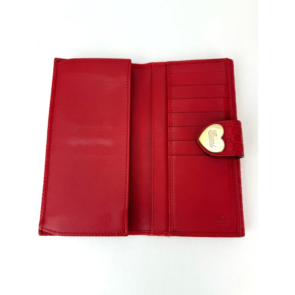 
                  
                    Gucci Microguccissima Heart Continental Red Leather Wallet
                  
                
