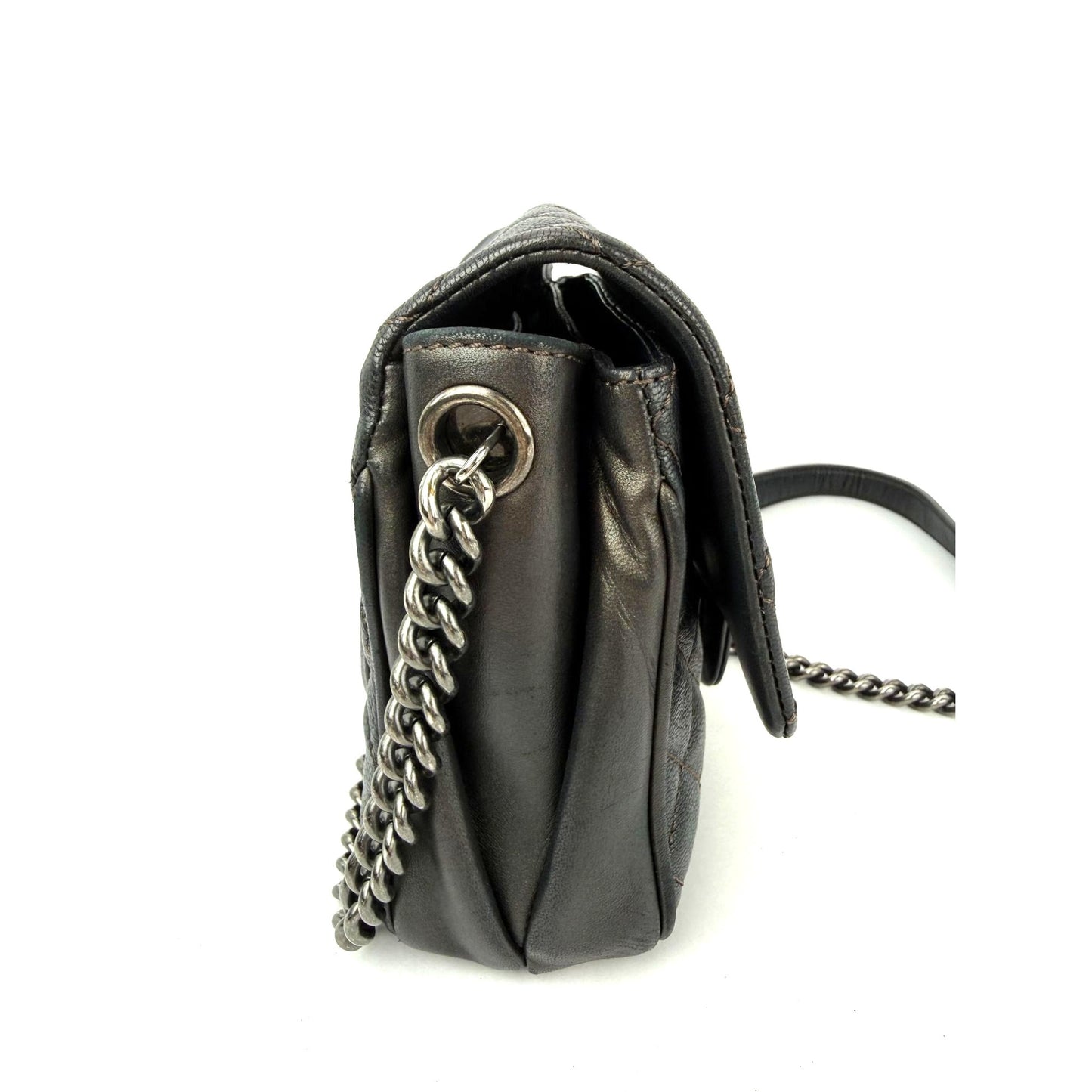 
                  
                    Chanel Metallic Goatskin Quilted Small Rock In Rome Flap Charcoal Crossbody Bag
                  
                