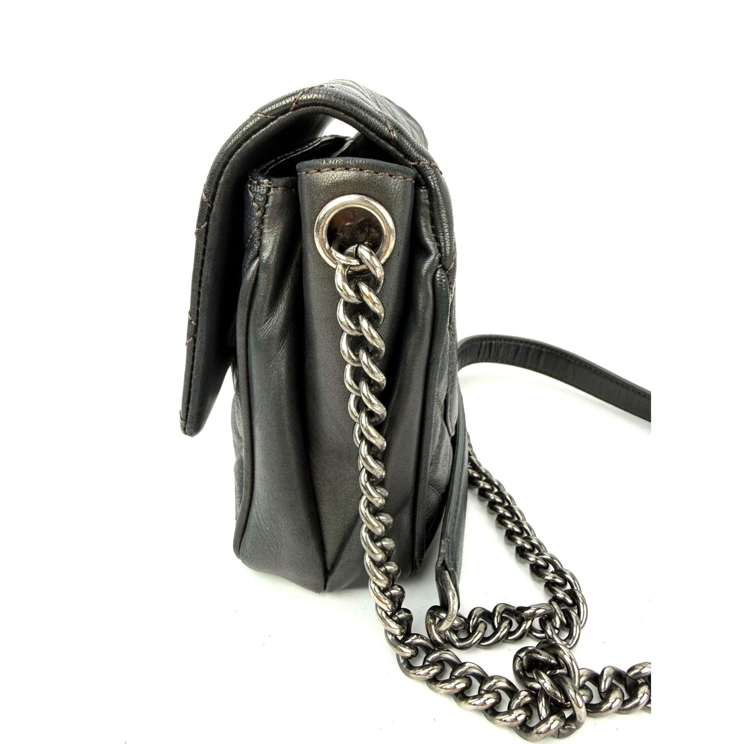 
                  
                    Chanel Metallic Goatskin Quilted Small Rock In Rome Flap Charcoal Crossbody Bag
                  
                