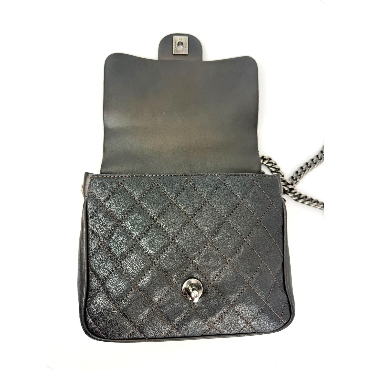 
                  
                    Chanel Metallic Goatskin Quilted Small Rock In Rome Flap Charcoal Crossbody Bag
                  
                