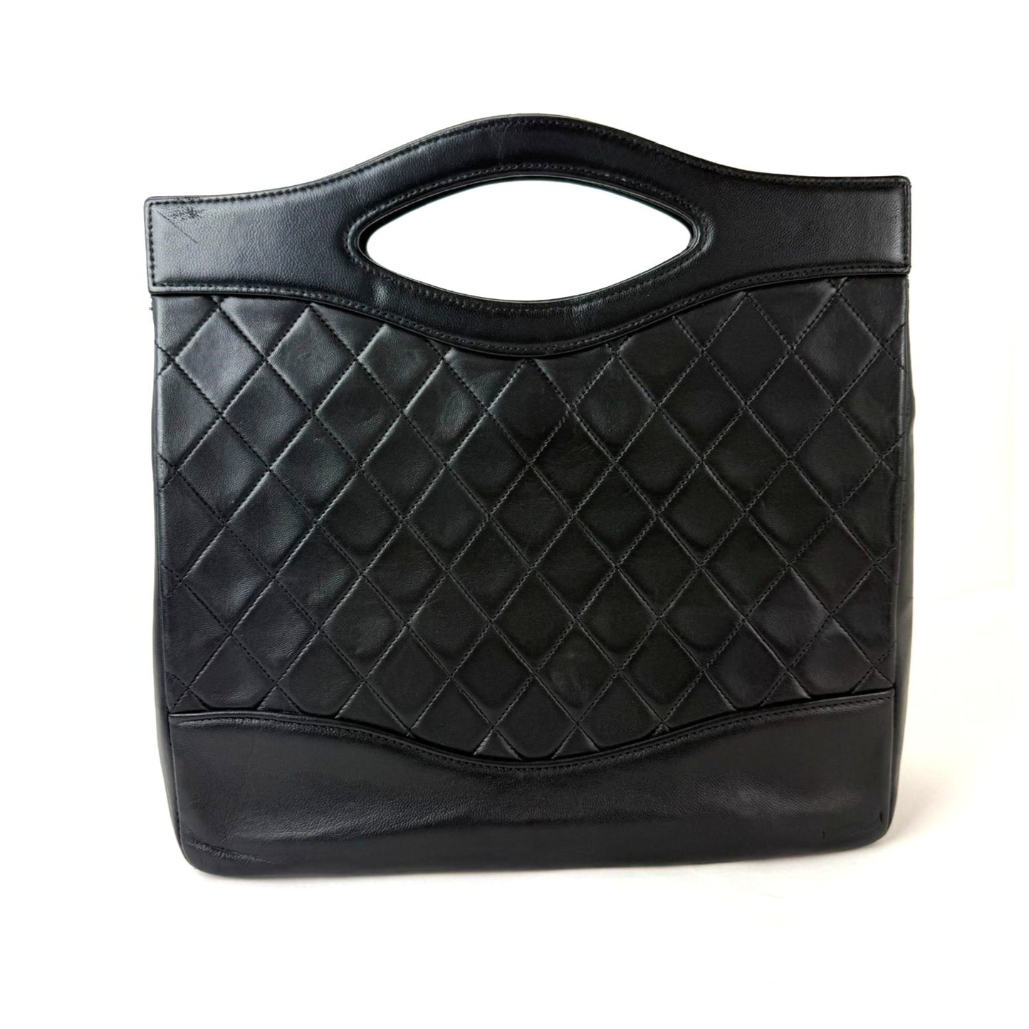 
                  
                    Chanel Vintage Cut Out Chain Handle Bag Quilted Lambskin Medium
                  
                