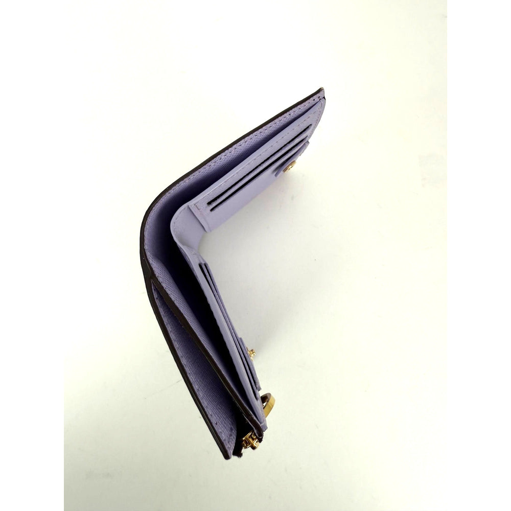 
                  
                    LOUIS VUITTON Lisa Monogram Purple Iris Lining Wallet
                  
                