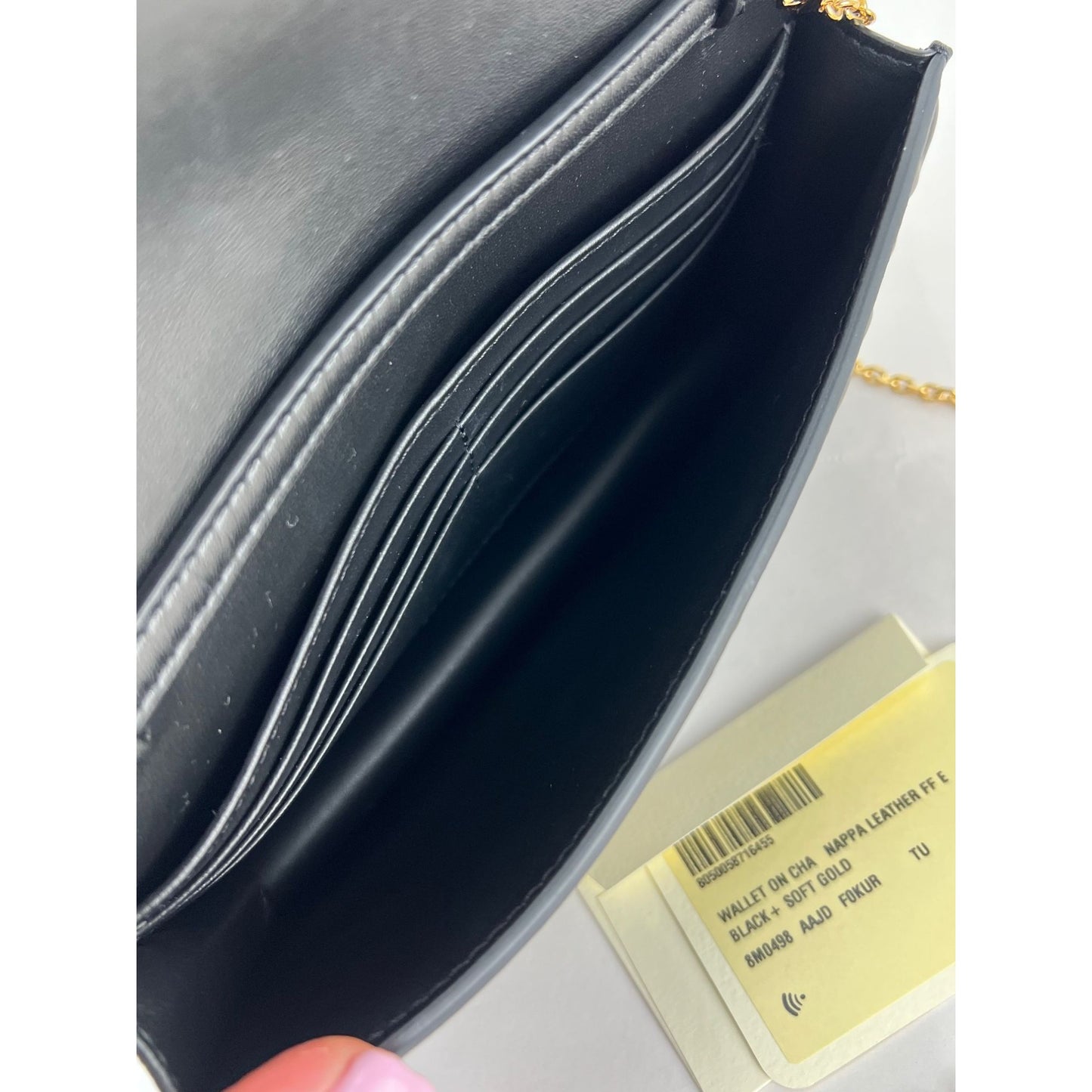 
                  
                    Fendi Tube Wallet on a Chain Black Nappa Leather Crossbody Bag
                  
                