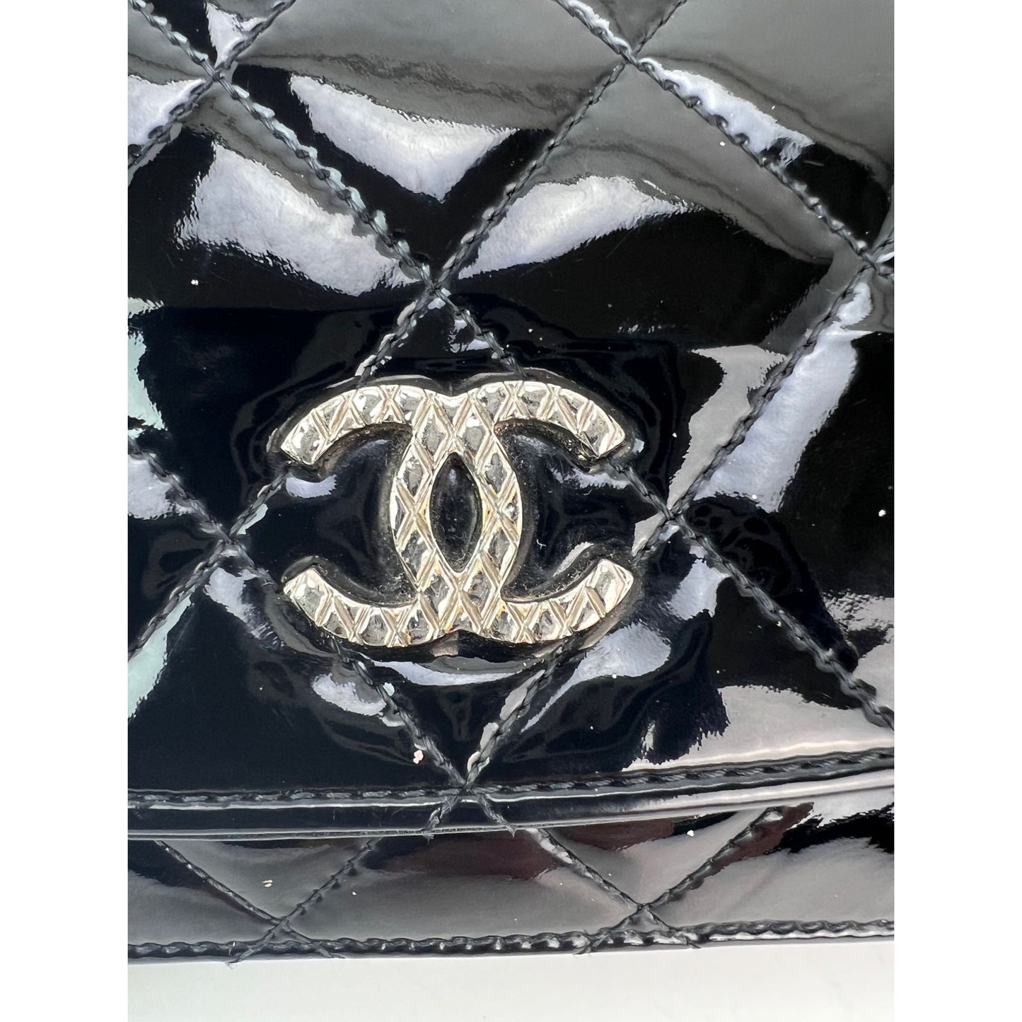 
                  
                    Chanel Quilted Patent Leather Wallet on a Chain Clutch
                  
                