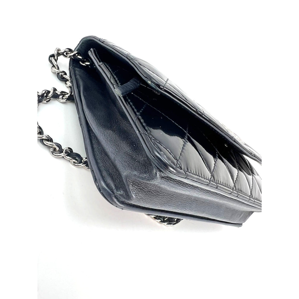 
                  
                    Chanel Quilted Patent Leather Wallet on a Chain Clutch
                  
                