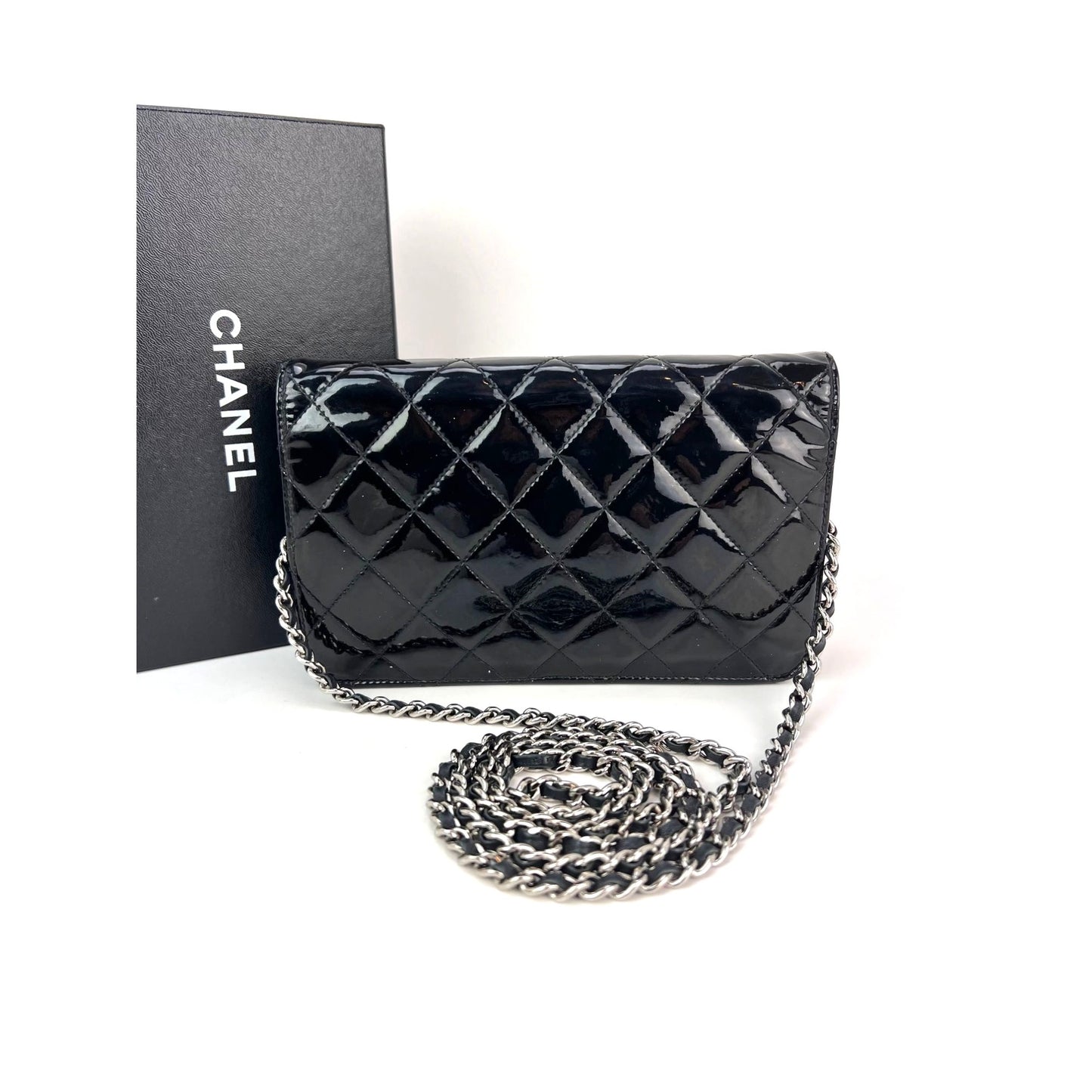 
                  
                    Chanel Quilted Patent Leather Wallet on a Chain Clutch
                  
                