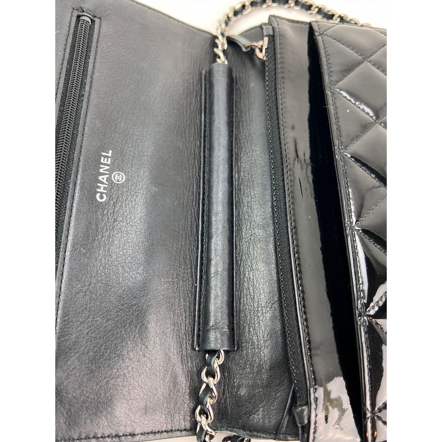 
                  
                    Chanel Quilted Patent Leather Wallet on a Chain Clutch
                  
                