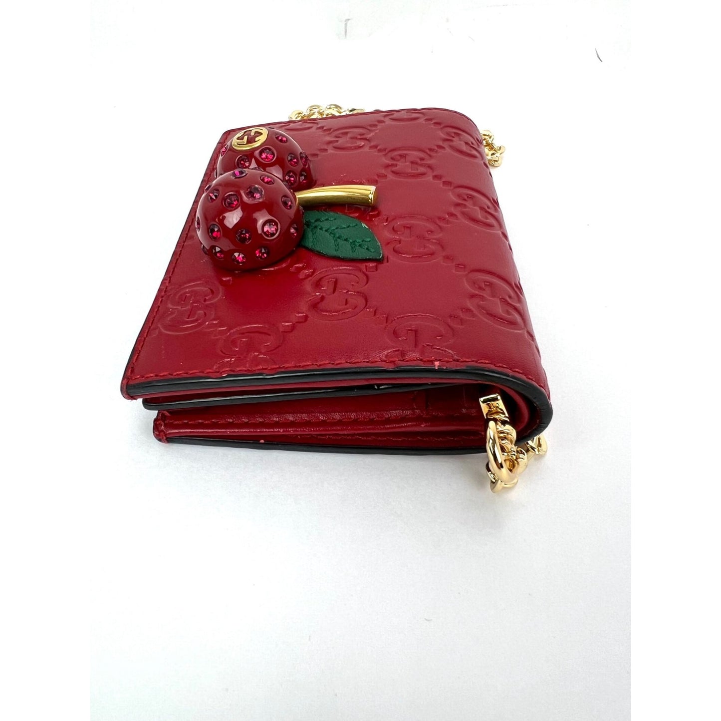 
                  
                    Gucci Guccissima Bifold Cherries Compact Red Leather Wallet  
                  
                