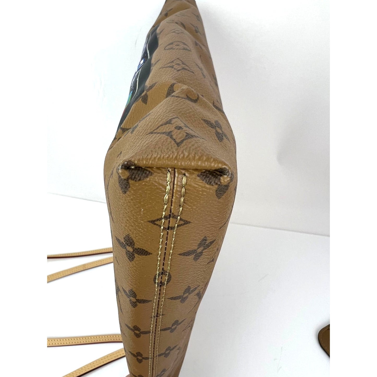 
                  
                    Louis Vuitton Carry It Limited Edition Reverse Monogram Video Tape Tote Bag
                  
                