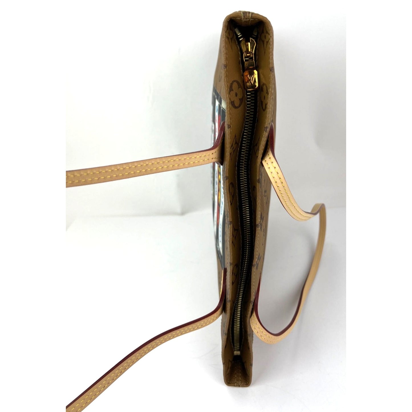 
                  
                    Louis Vuitton Carry It Limited Edition Reverse Monogram Video Tape Tote Bag
                  
                