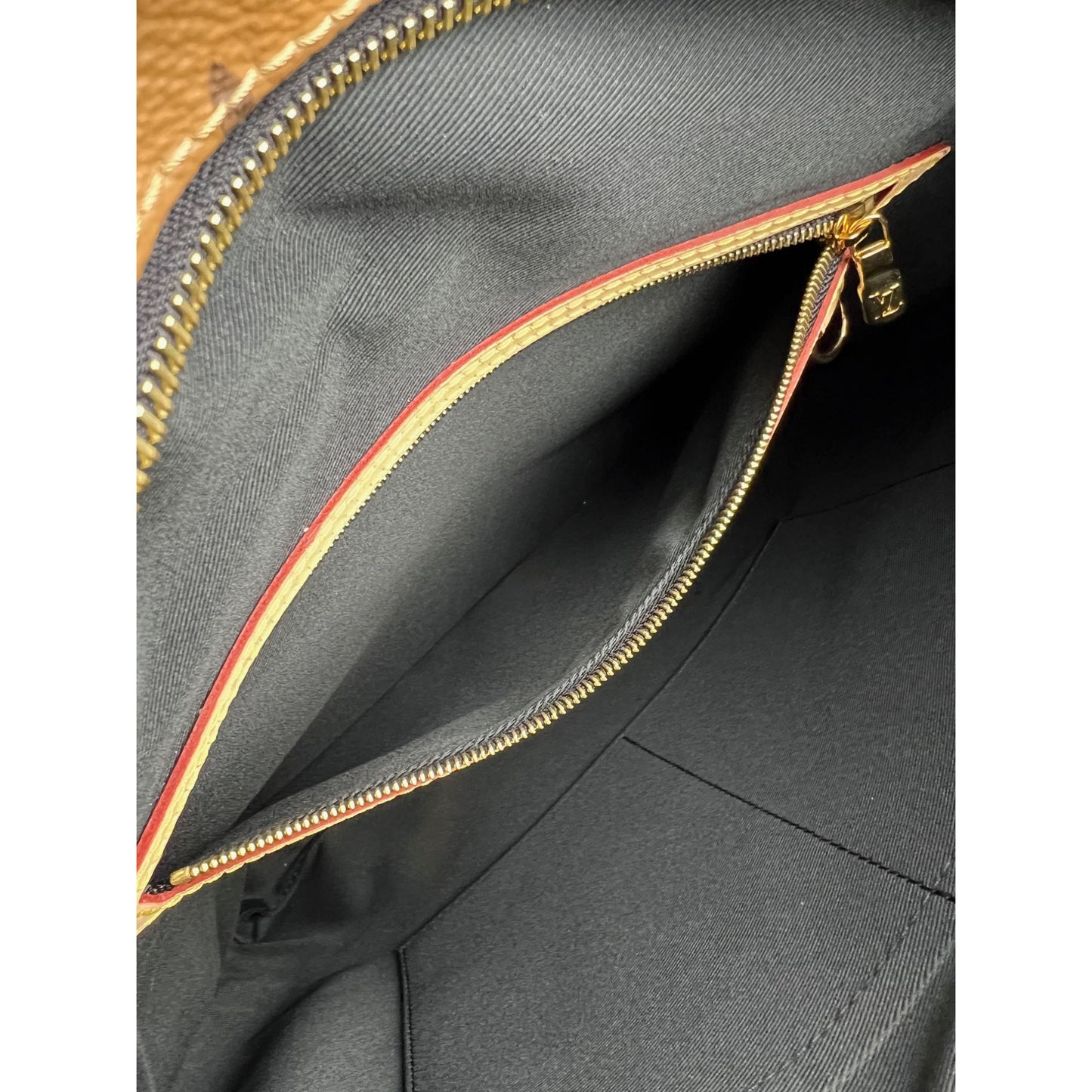 
                  
                    Louis Vuitton Carry It Limited Edition Reverse Monogram Video Tape Tote Bag
                  
                