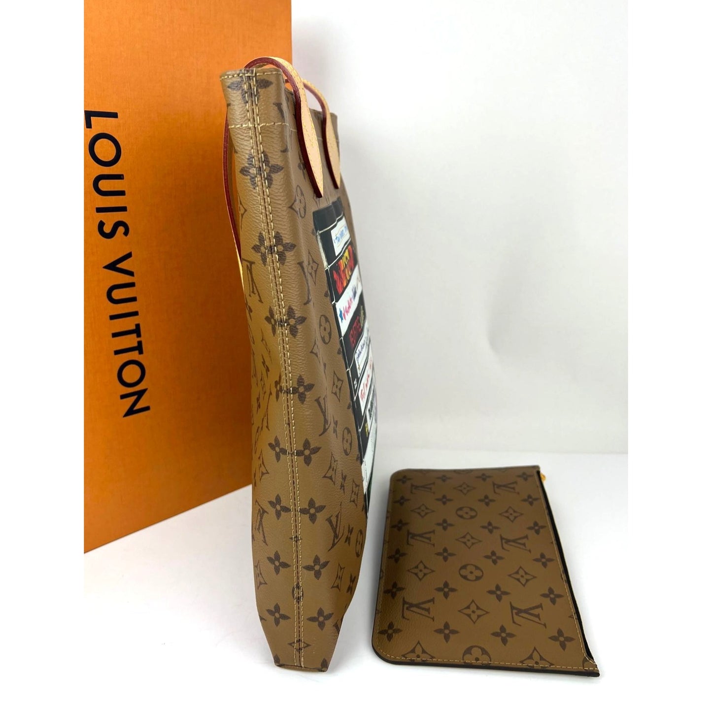 
                  
                    Louis Vuitton Carry It Limited Edition Reverse Monogram Video Tape Tote Bag
                  
                