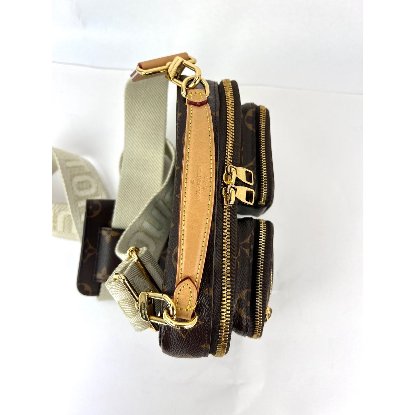 
                  
                    Louis Vuitton Utility Monogram Crossbody Bag
                  
                