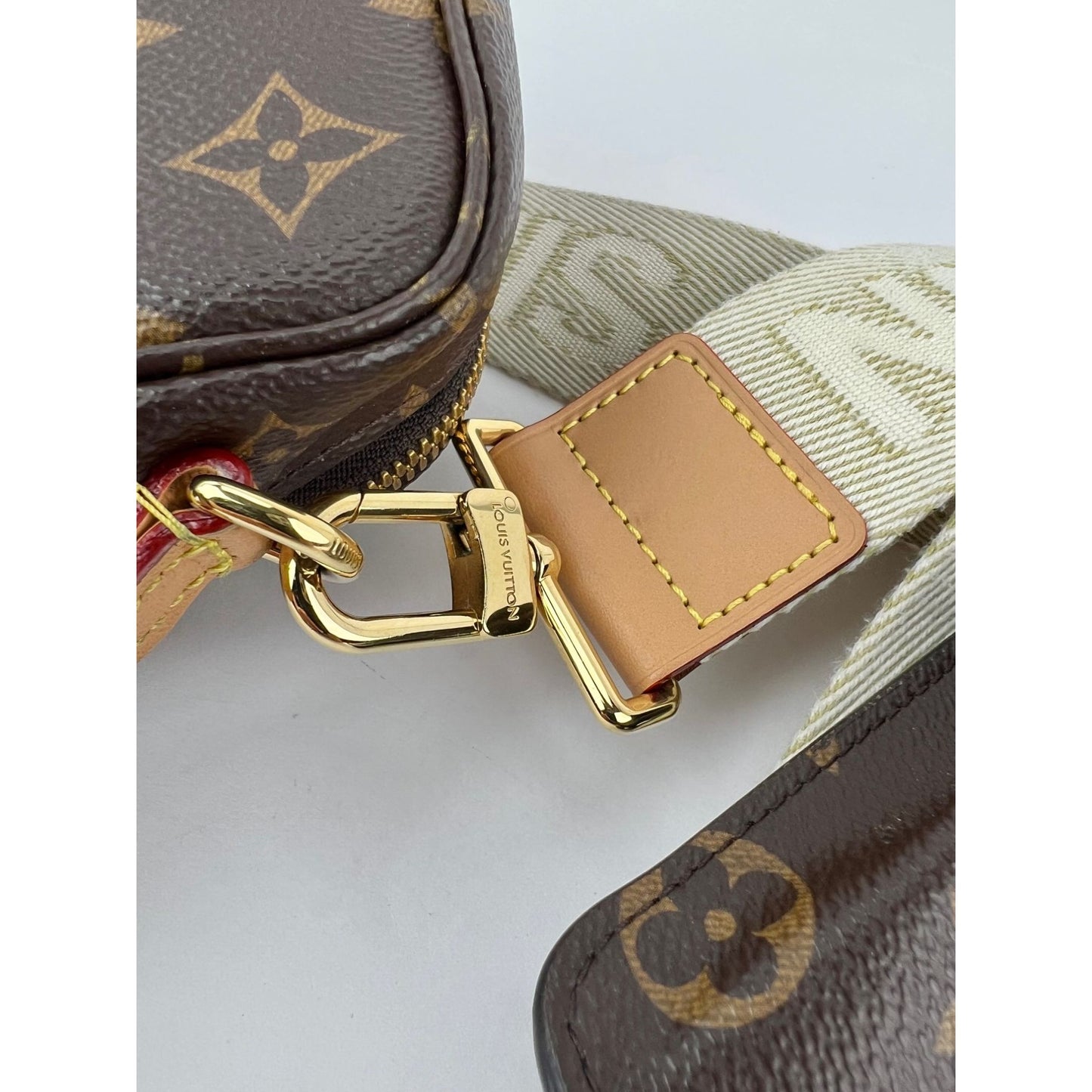 
                  
                    Louis Vuitton Utility Monogram Crossbody Bag
                  
                