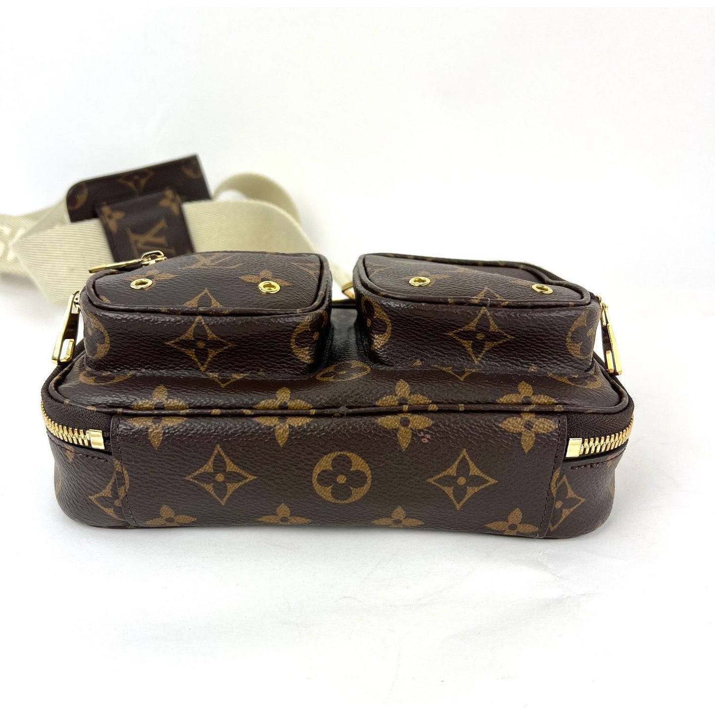 
                  
                    Louis Vuitton Utility Monogram Crossbody Bag
                  
                