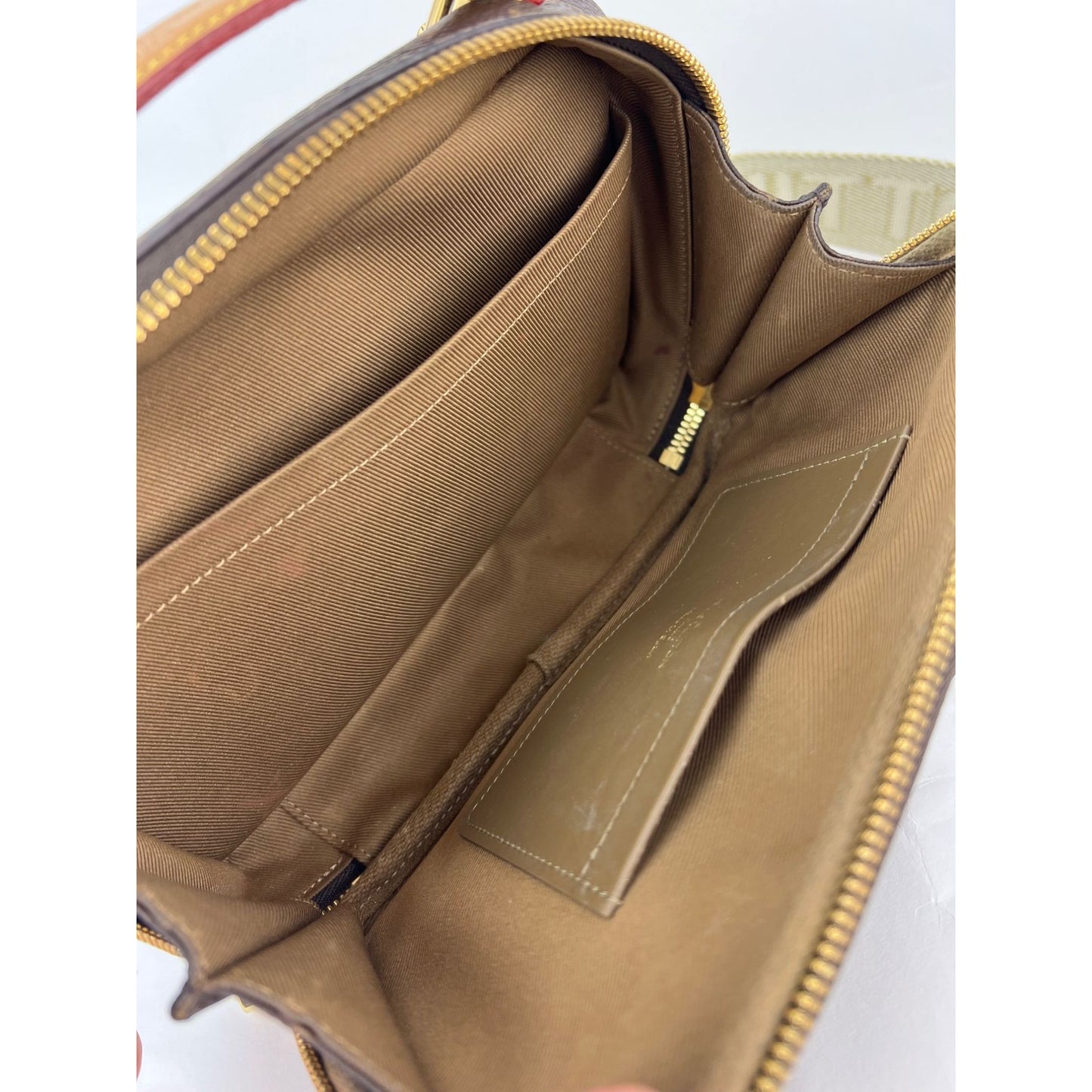 
                  
                    Louis Vuitton Utility Monogram Crossbody Bag
                  
                