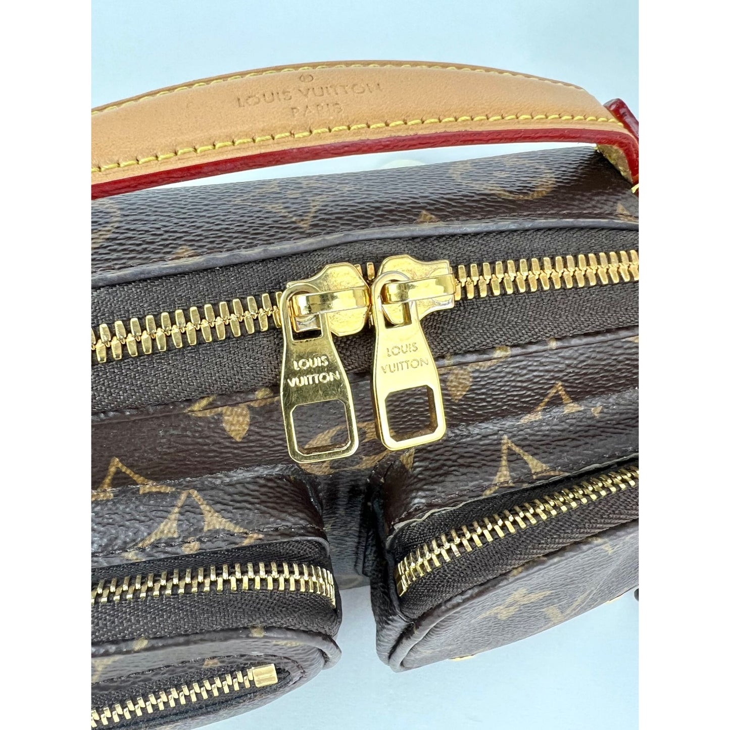 
                  
                    Louis Vuitton Utility Monogram Crossbody Bag
                  
                