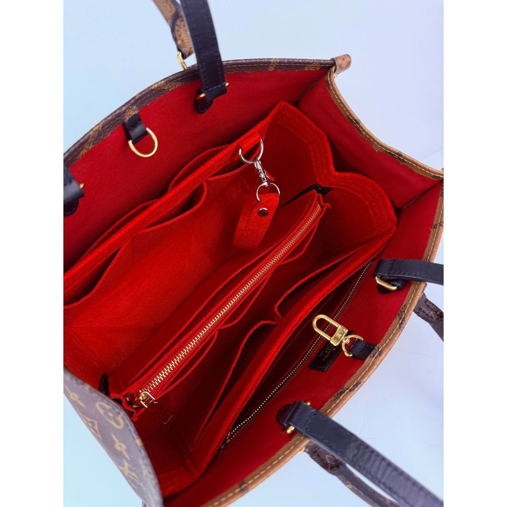 
                  
                    Louis Vuitton ONTHEGO MM Reverse Giant Monogram Tote
                  
                