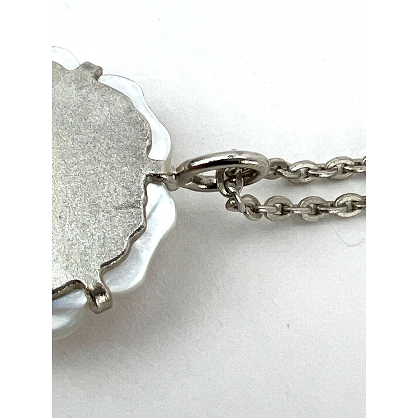 
                  
                    Chanel Mother of Pearl Camellia Pendant Necklace
                  
                