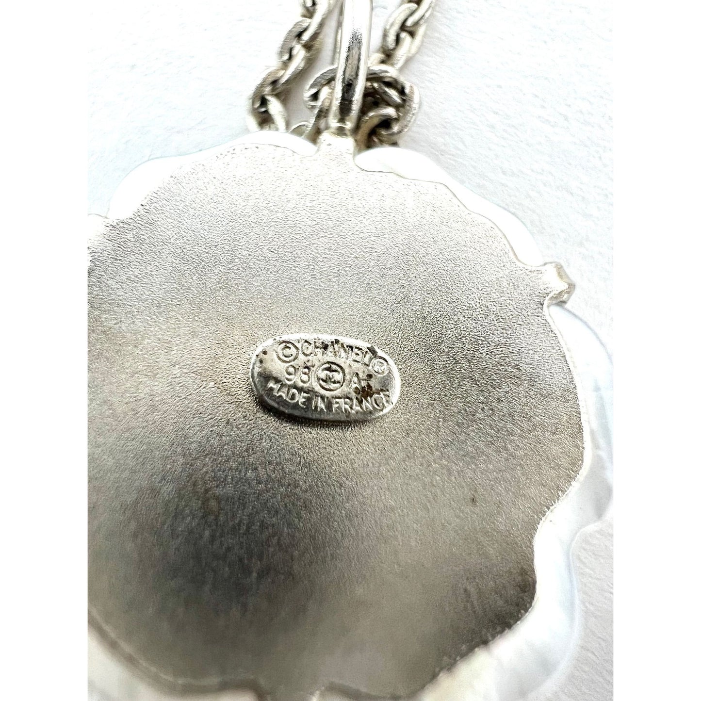 
                  
                    Chanel Mother of Pearl Camellia Pendant Necklace
                  
                