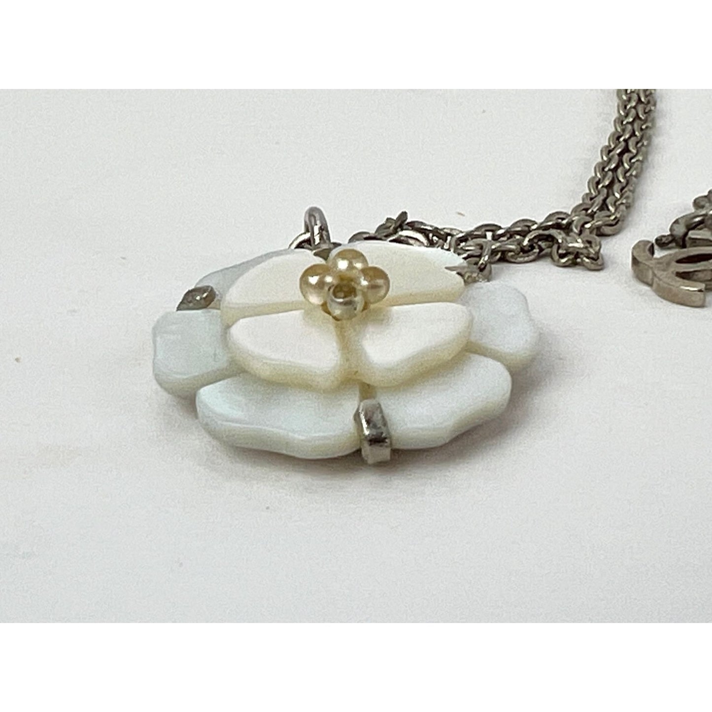 
                  
                    Chanel Mother of Pearl Camellia Pendant Necklace
                  
                