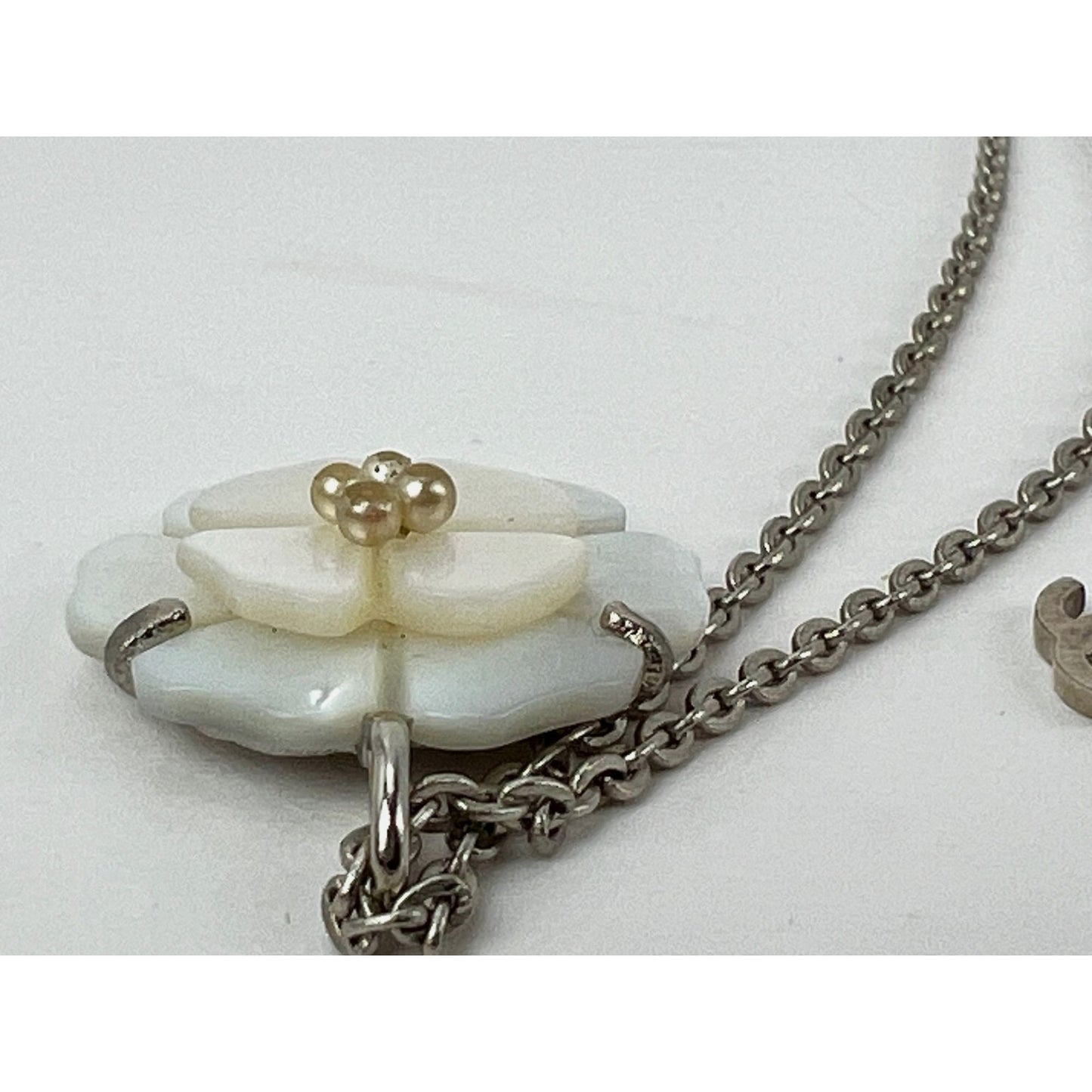 
                  
                    Chanel Mother of Pearl Camellia Pendant Necklace
                  
                