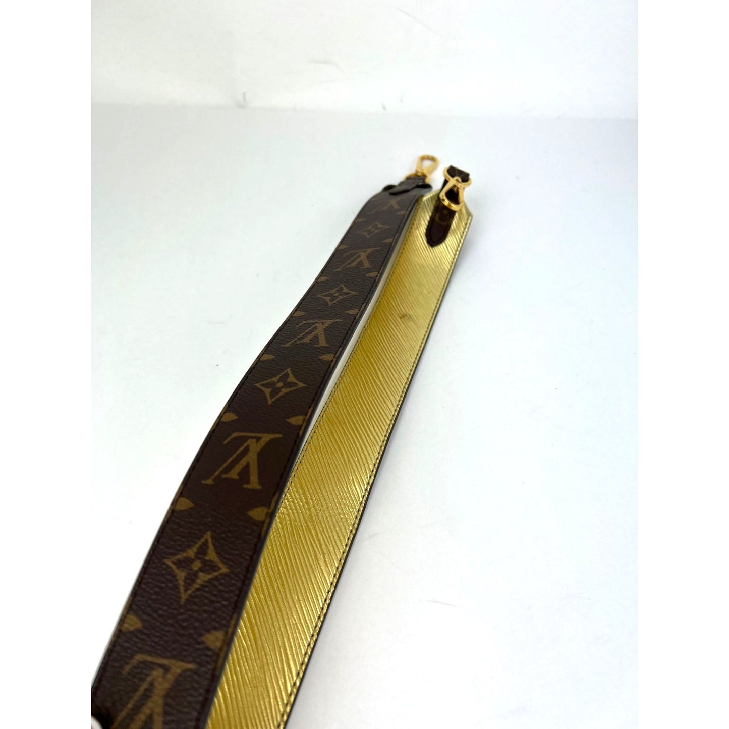 
                  
                    Louis Vuitton Bandouliere Reversible Monogram Gold Epi Leather Shoulder Strap Brown
                  
                