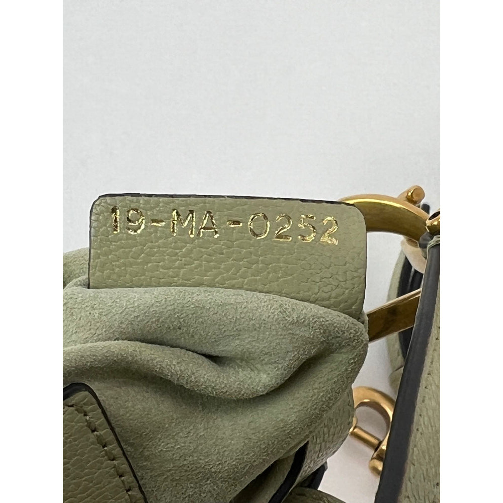 
                  
                    Christian Dior Goatskin Light Green Micro Saddle Bag with Strap
                  
                