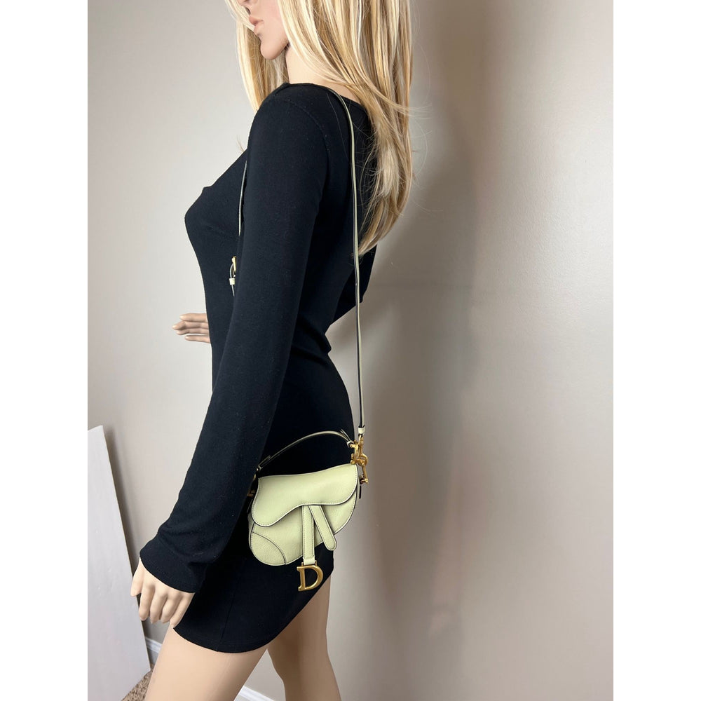 
                  
                    Christian Dior Goatskin Light Green Micro Saddle Bag with Strap
                  
                