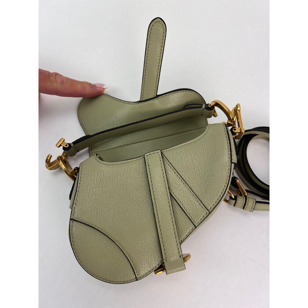 
                  
                    Christian Dior Goatskin Light Green Micro Saddle Bag with Strap
                  
                