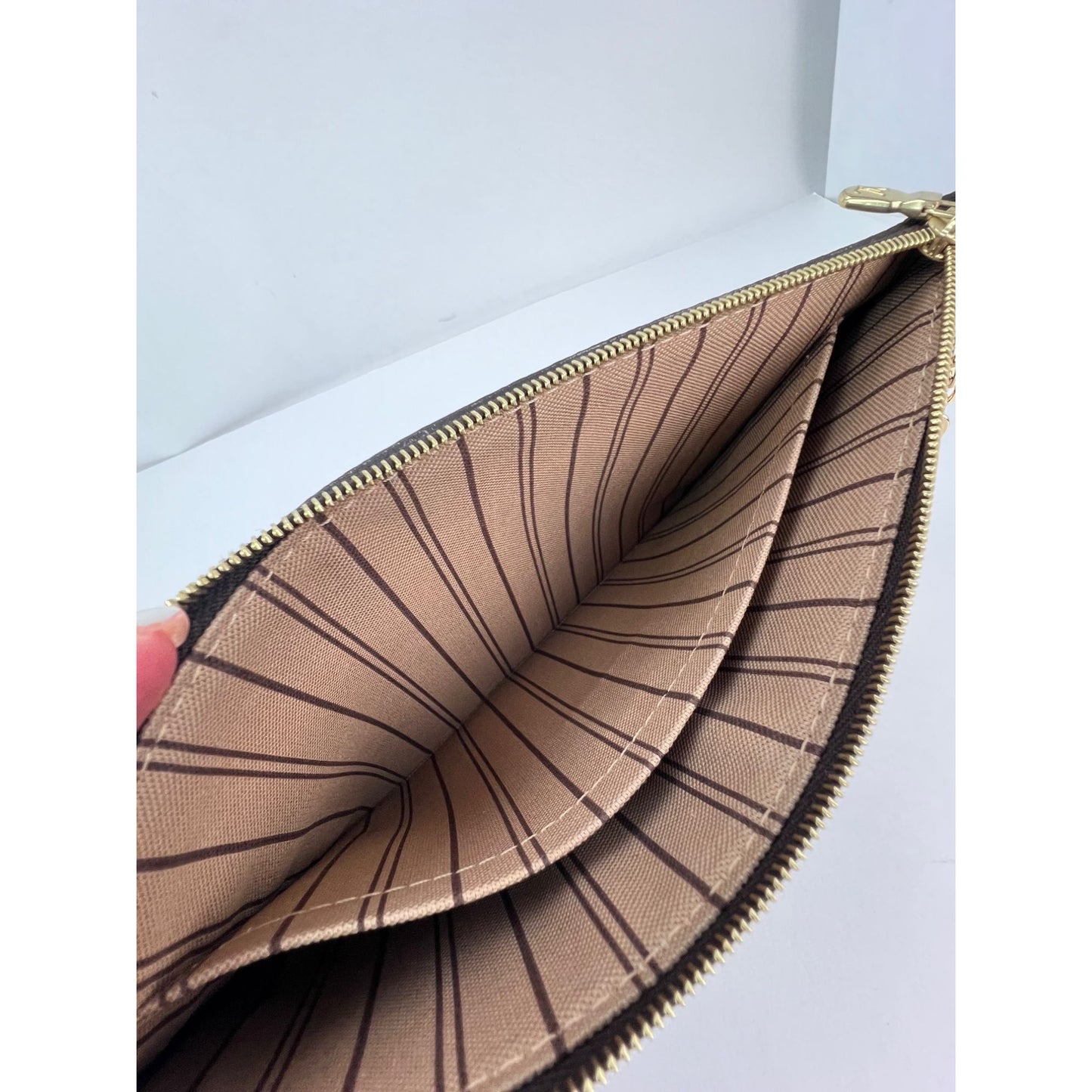 
                  
                    Louis Vuitton Monogram Pochette from Neverfull Clutch Bag
                  
                