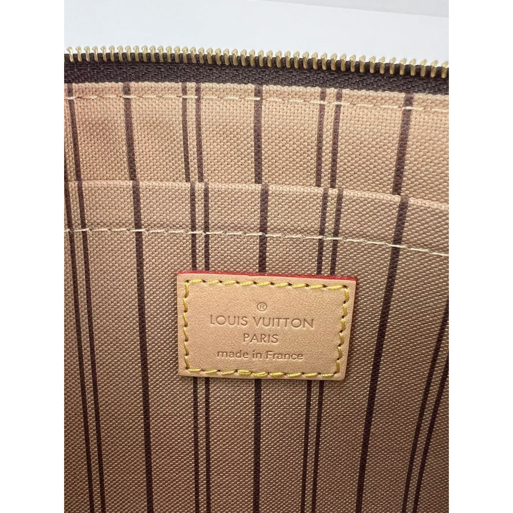
                  
                    Louis Vuitton Monogram Pochette from Neverfull Clutch Bag
                  
                