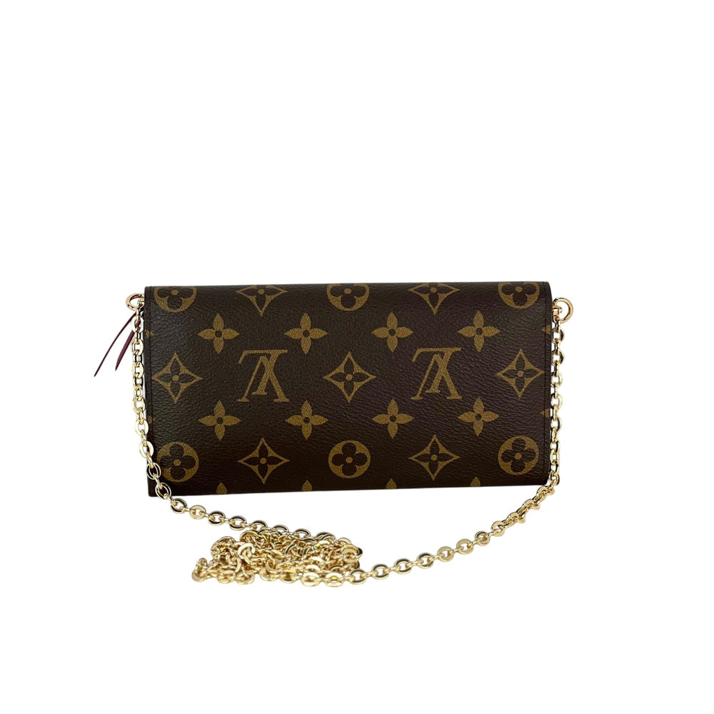 
                  
                    Louis Vuitton Emilie Monogram Fuchsia Wallet Clutch
                  
                