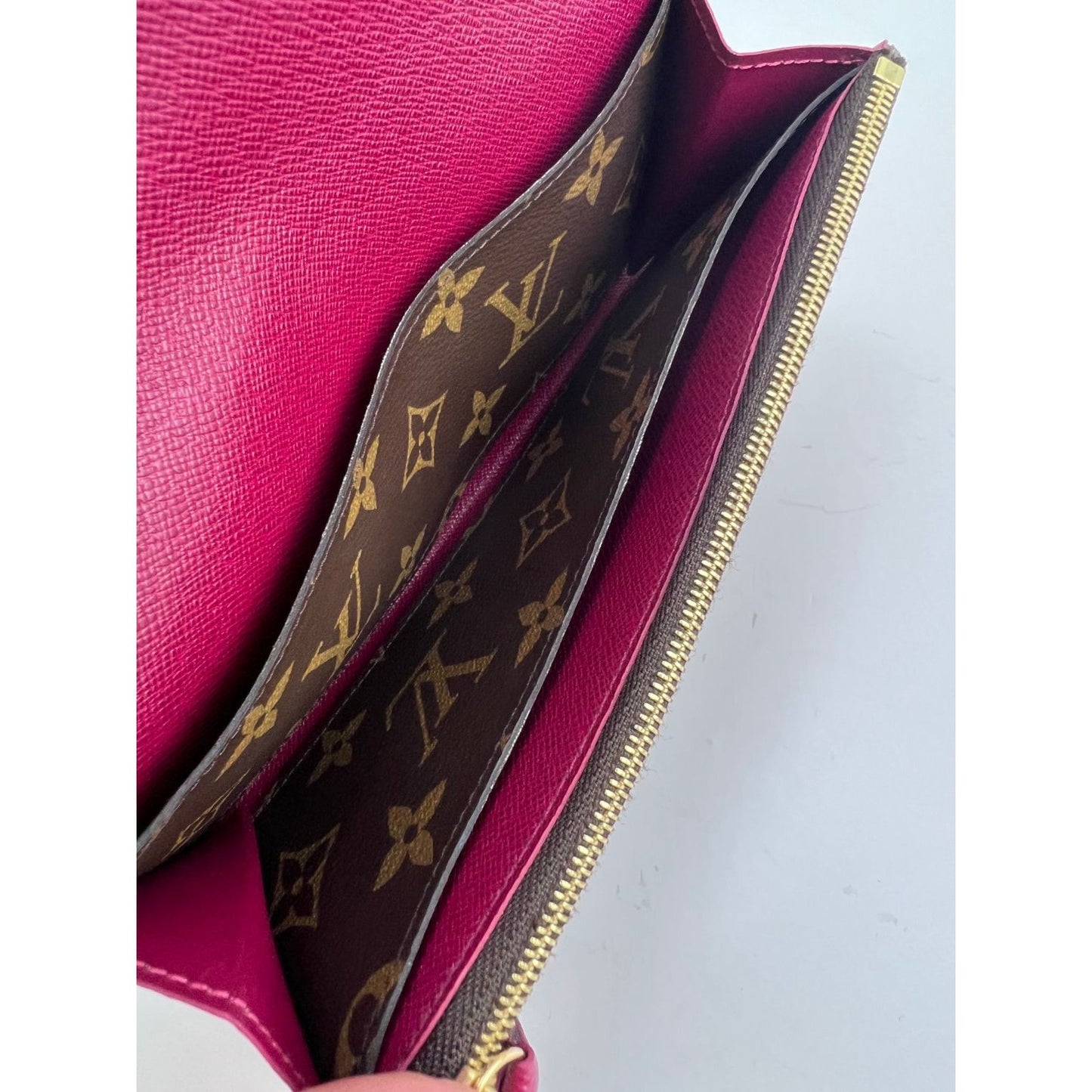 
                  
                    Louis Vuitton Emilie Monogram Fuchsia Wallet Clutch
                  
                