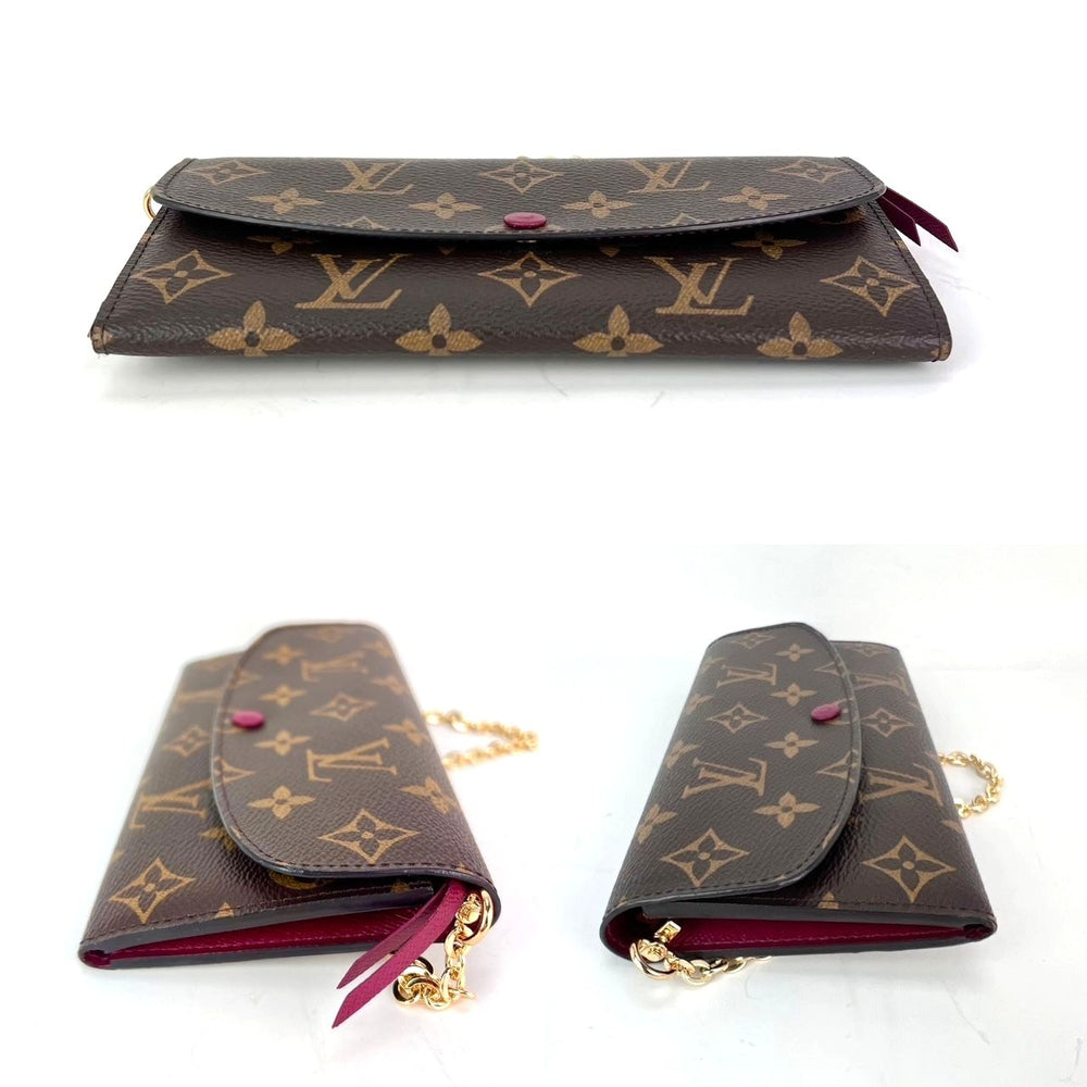 
                  
                    Louis Vuitton Emilie Monogram Fuchsia Wallet Clutch
                  
                