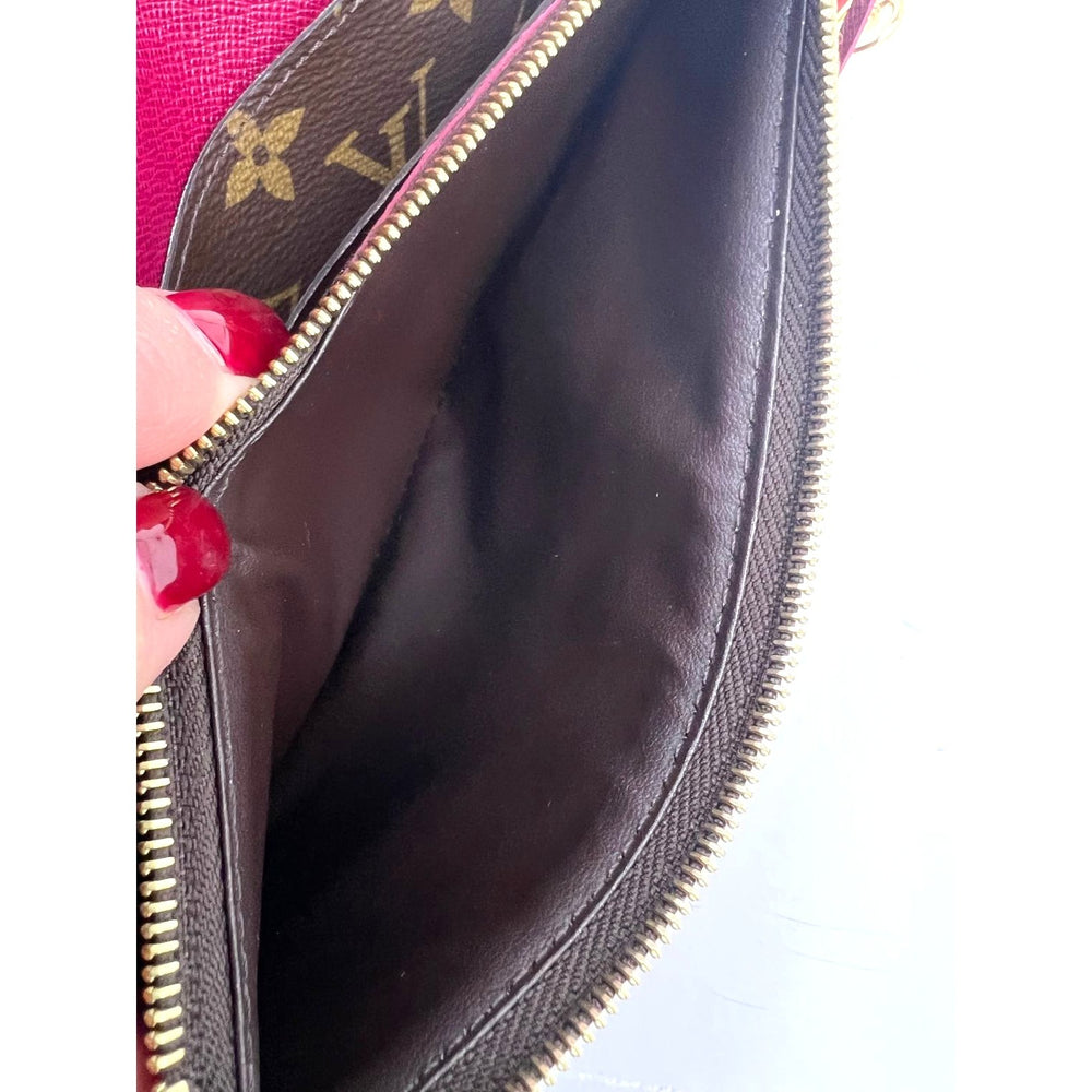 
                  
                    Louis Vuitton Emilie Monogram Fuchsia Wallet Clutch
                  
                